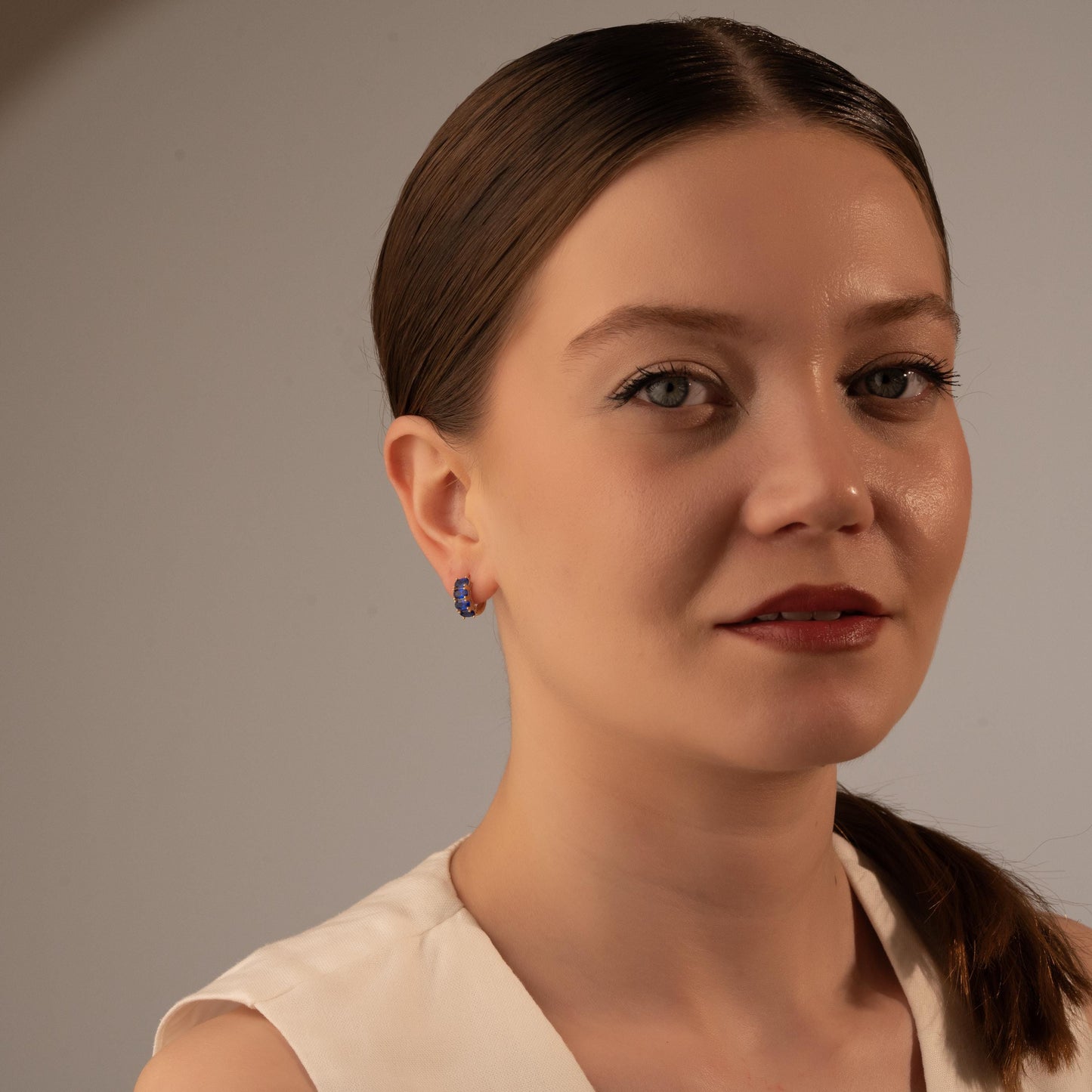 Sparkling Blue Gemstone Huggie Earrings in Gilded Hoops - Perfectly Pretty Gift Idea